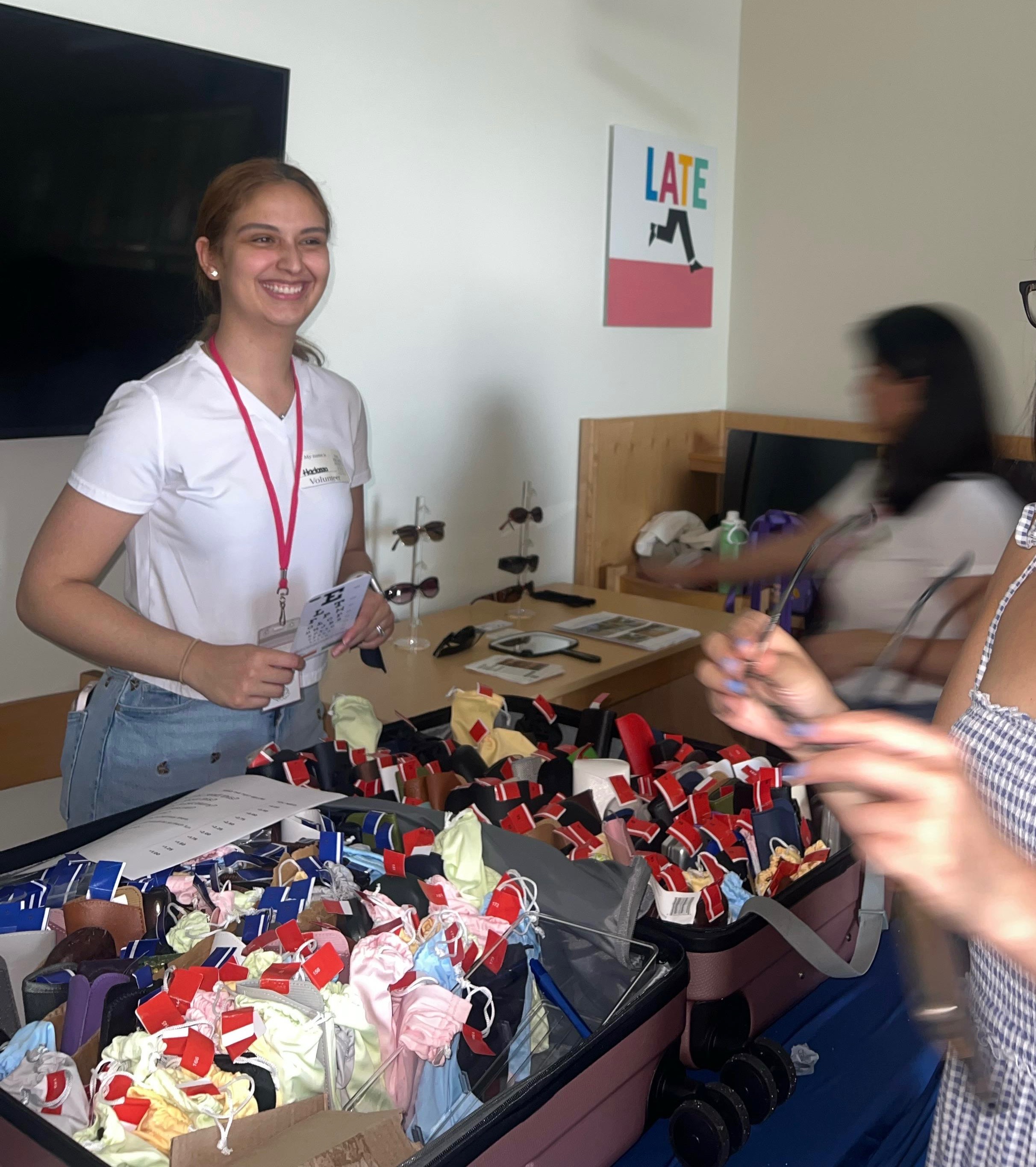 Volunteer with glasses inventory